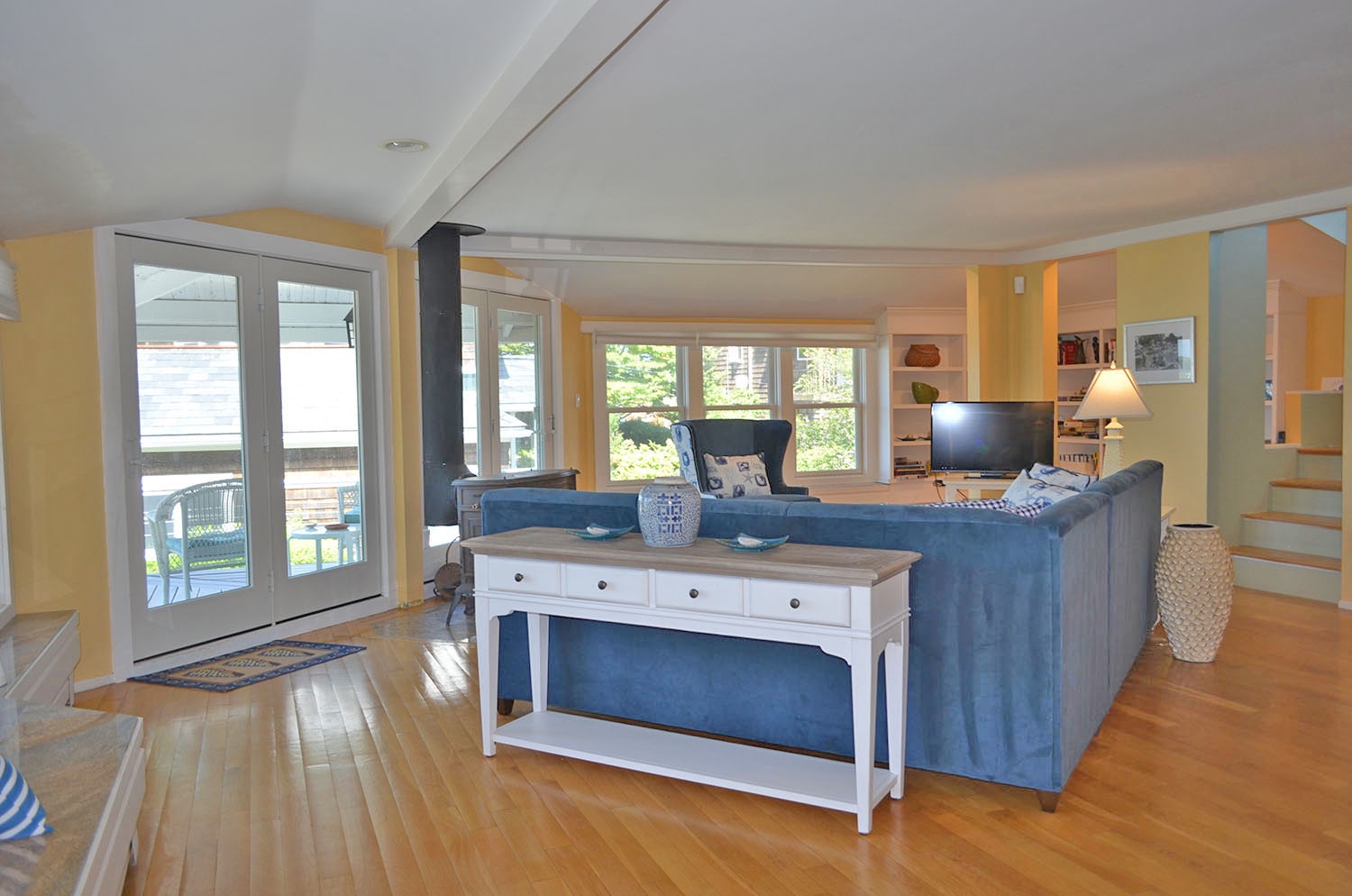 The living room is open, airy, and bright.