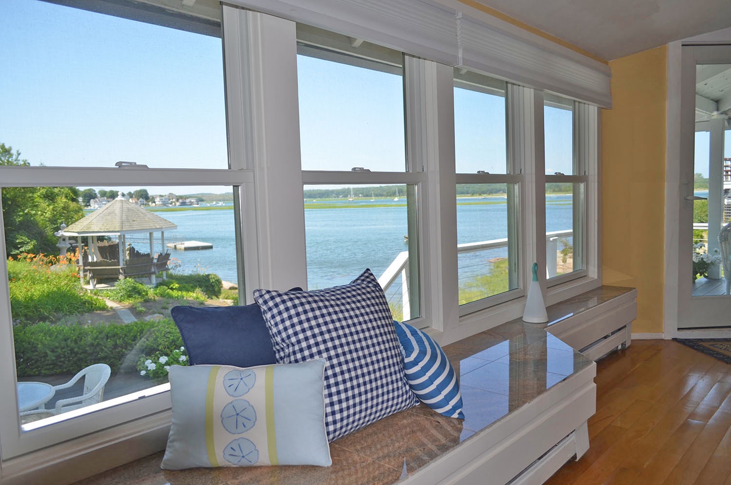 Large picture windows provide amazing river views.