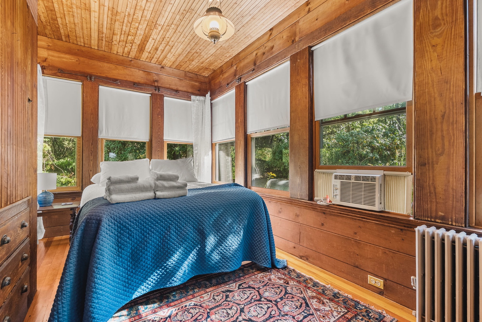 First floor Queen Bedroom with pleasant views of the garden.