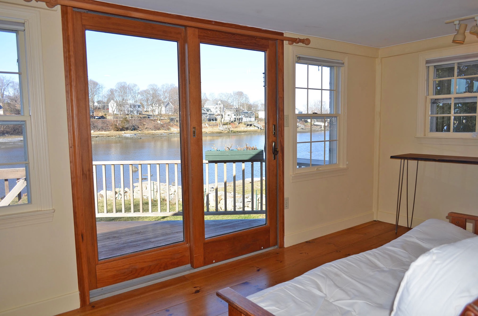 Head on out to the back deck through the glass sliders.