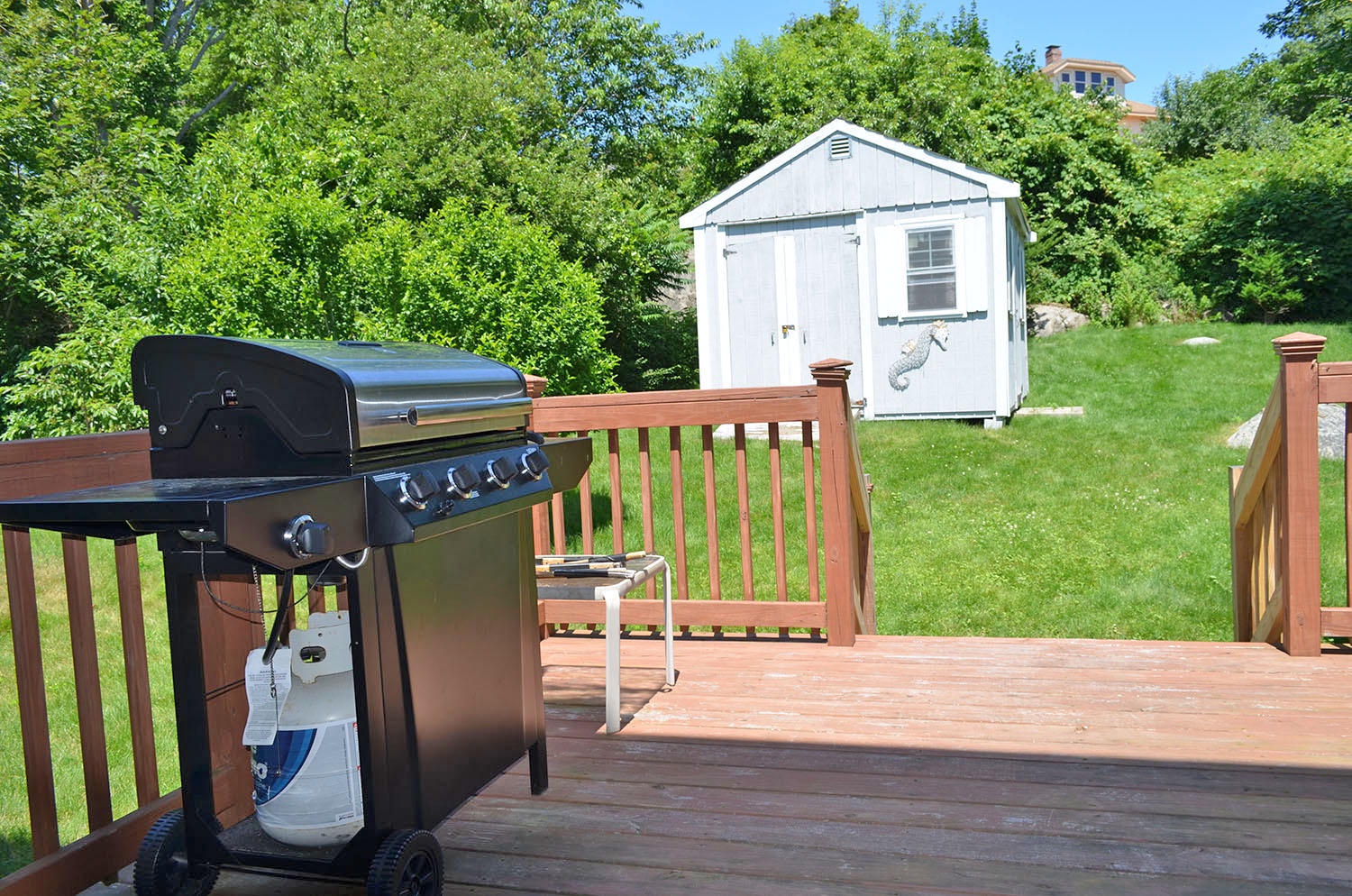 Enjoy grilling and dining al fresco on the back deck.