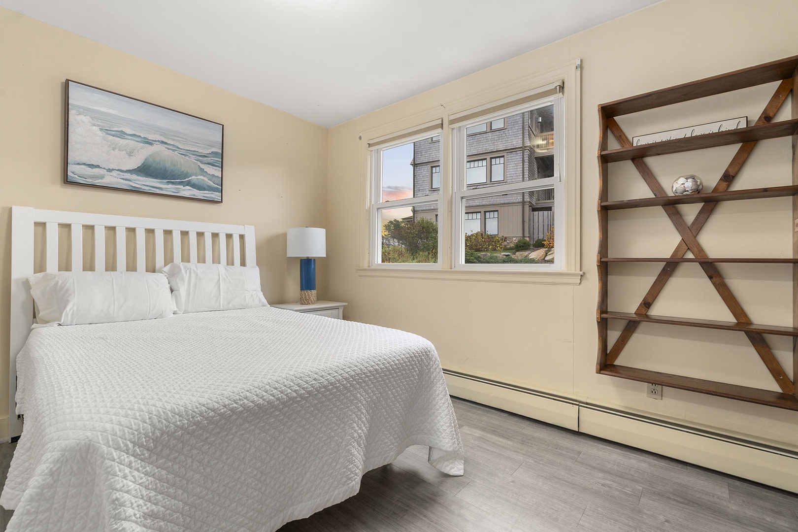 First bedroom with a queen bed on the upper floor.