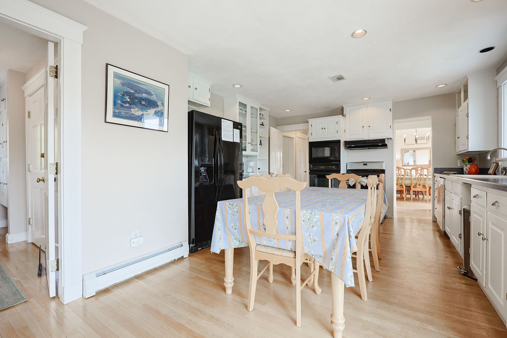 The kitchen is fully equipped with plenty of space for making home-cooked meals.