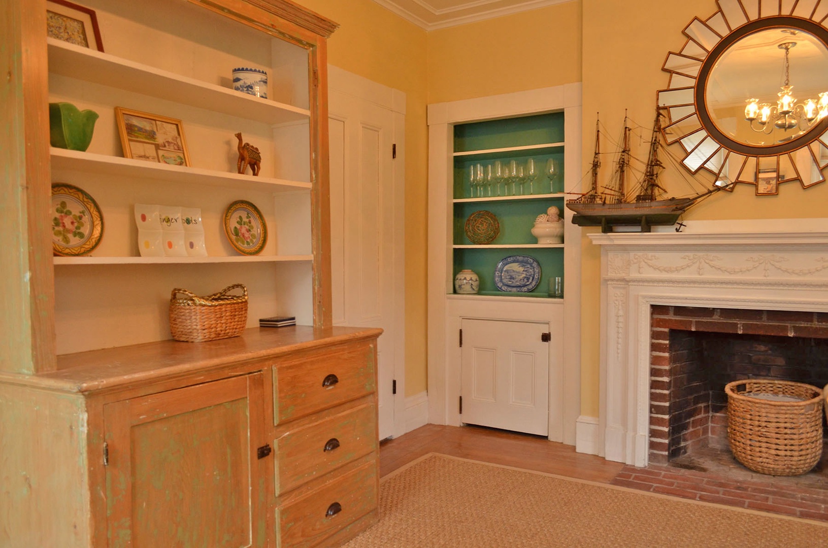 Historic architecture meets new: a beautiful built-in cabinet and a stand alone hutch.