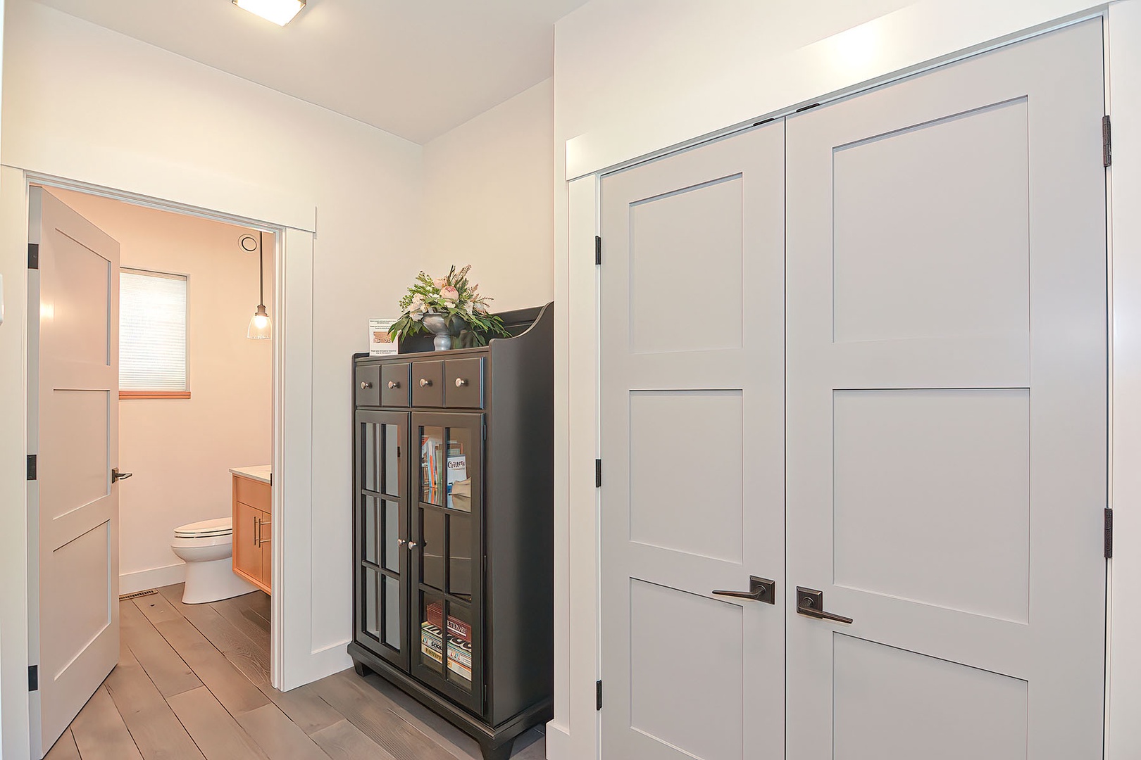 Front hall closet and powder room.