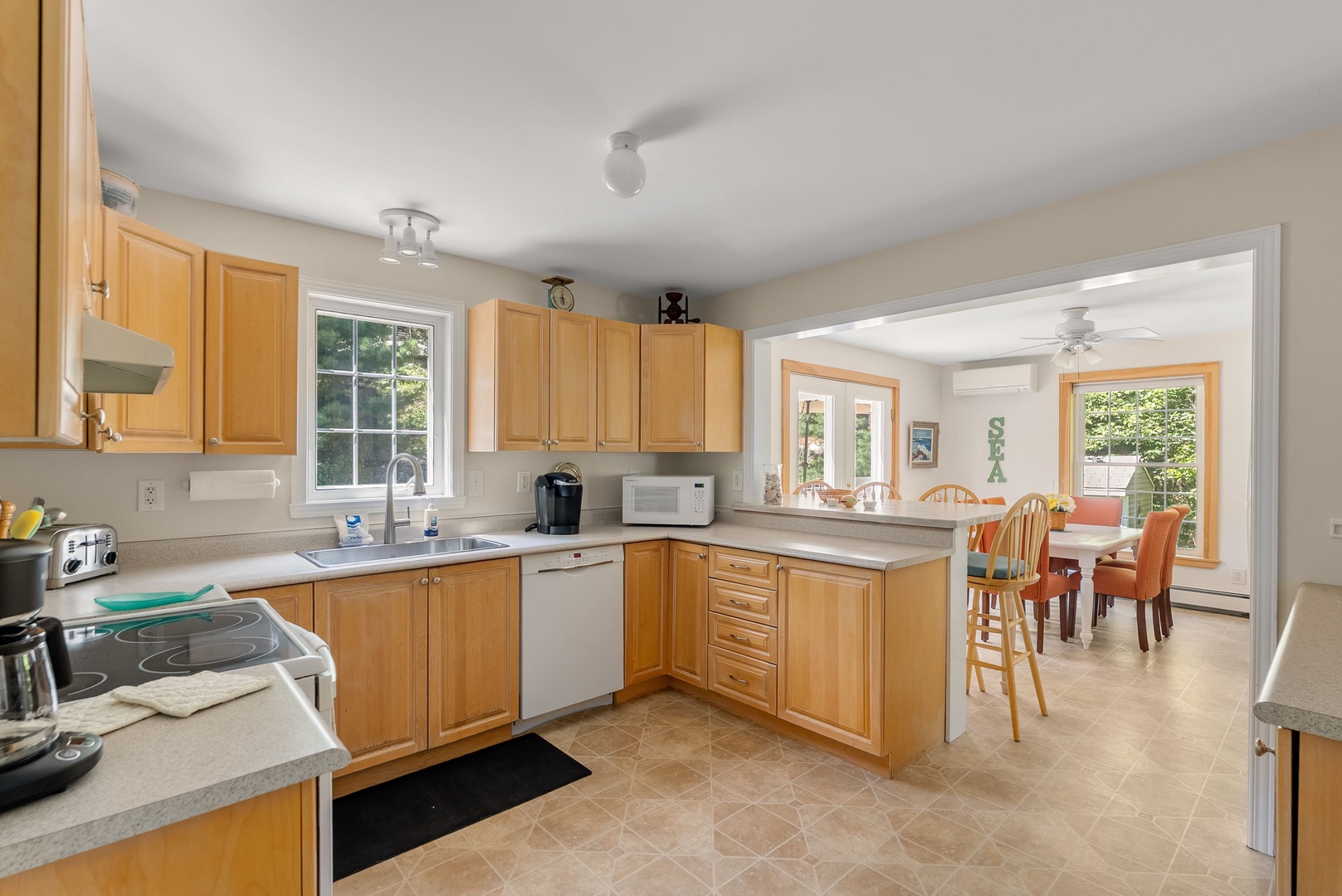 The kitchen is right next to the dining area.