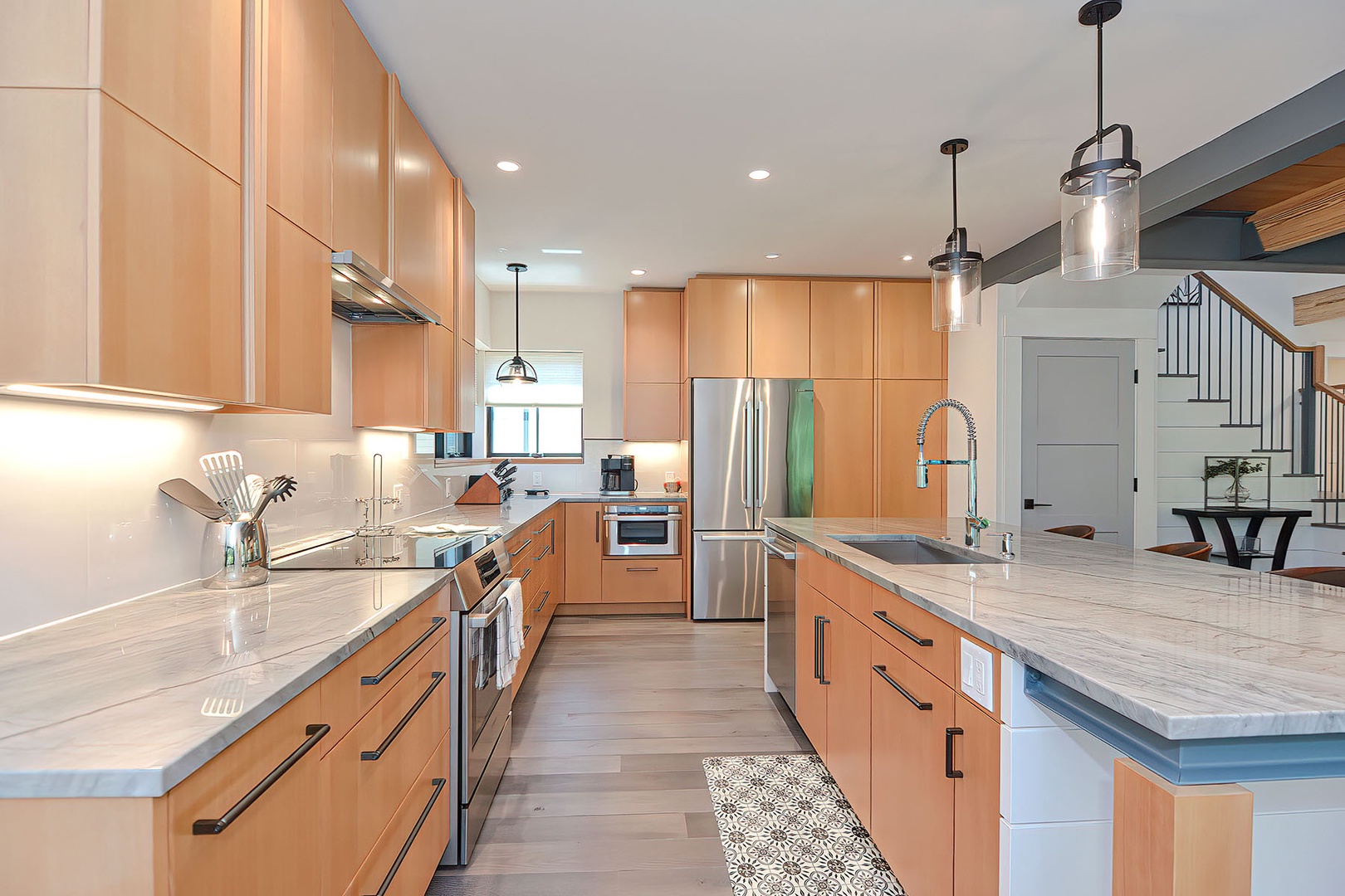 The kitchen has Bosch stainless steel appliances.