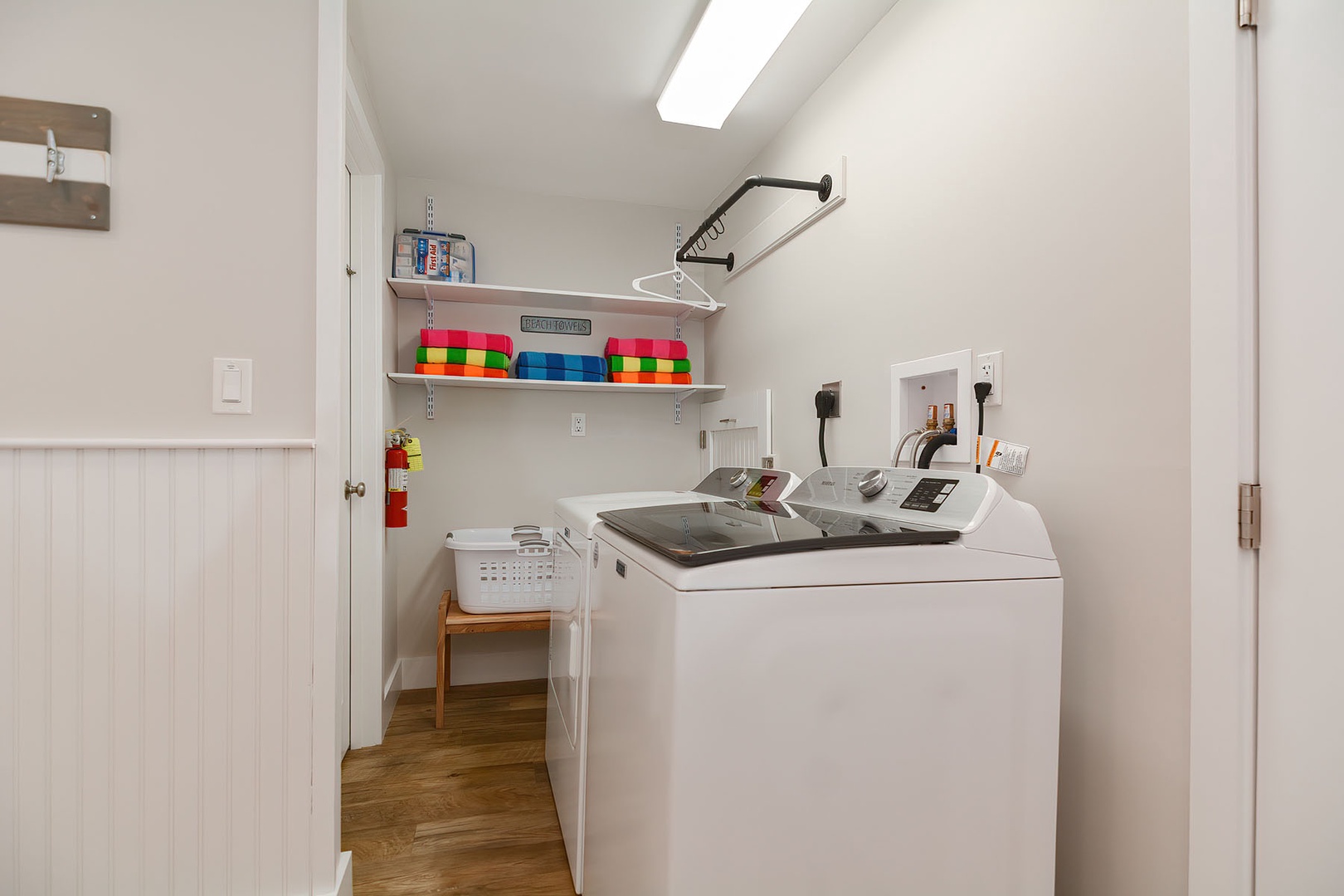 Laundry area with beach towels.