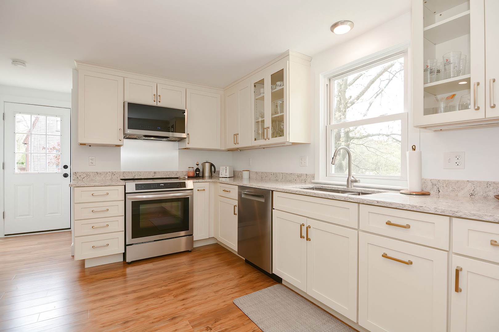 Kitchen with access to the backdoor.