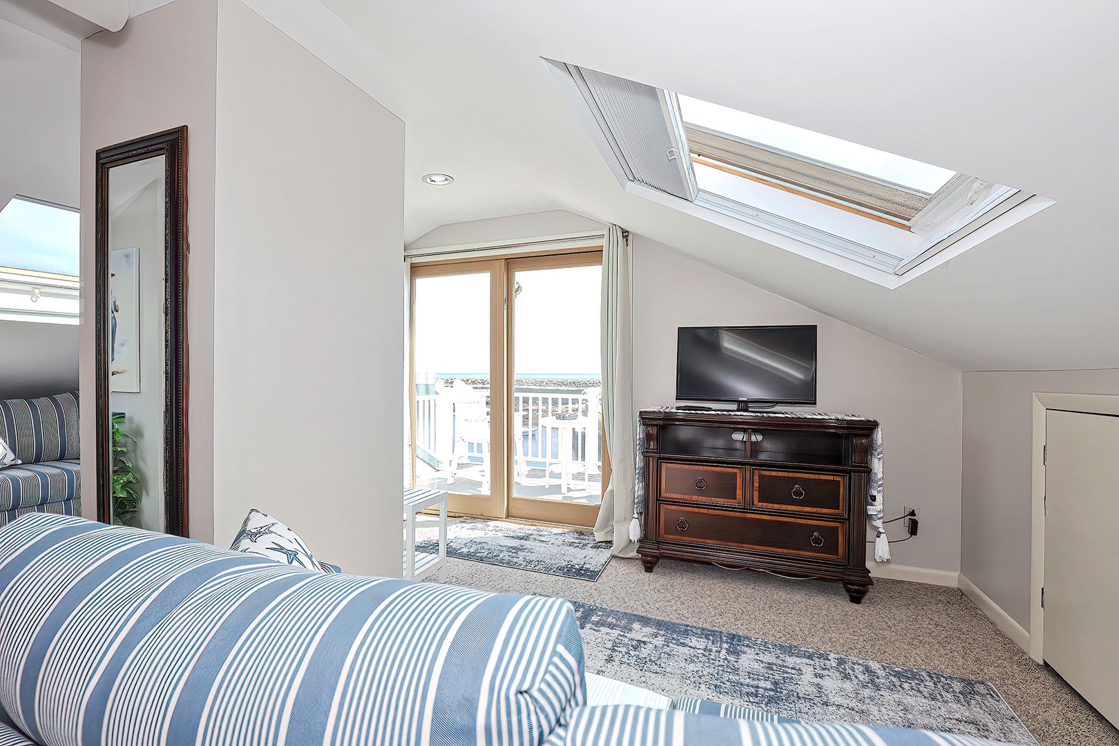 Watch tv in the sitting area.