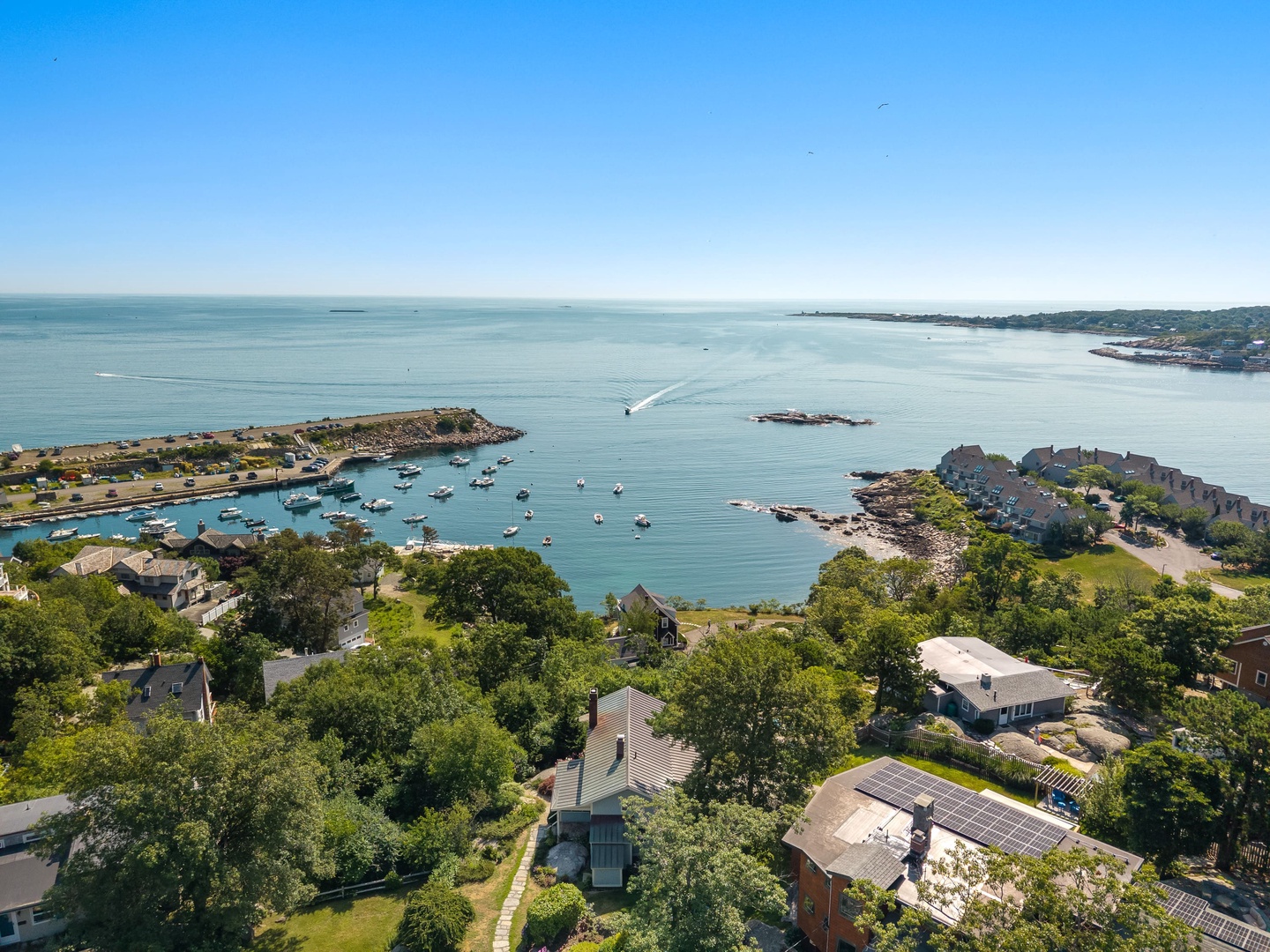 Aerial view of the house with beautiful views of Sandy Bay.