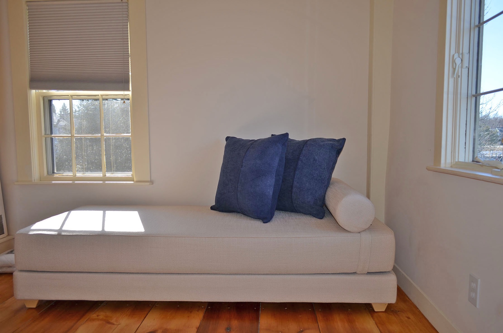 Relax on the settee and admire the views from this sitting room.