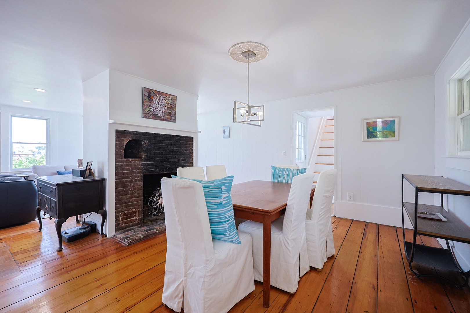 The dining room is just past the living room.