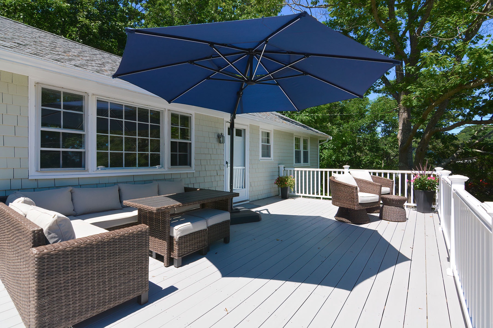 Spacious front deck with plenty of seating.