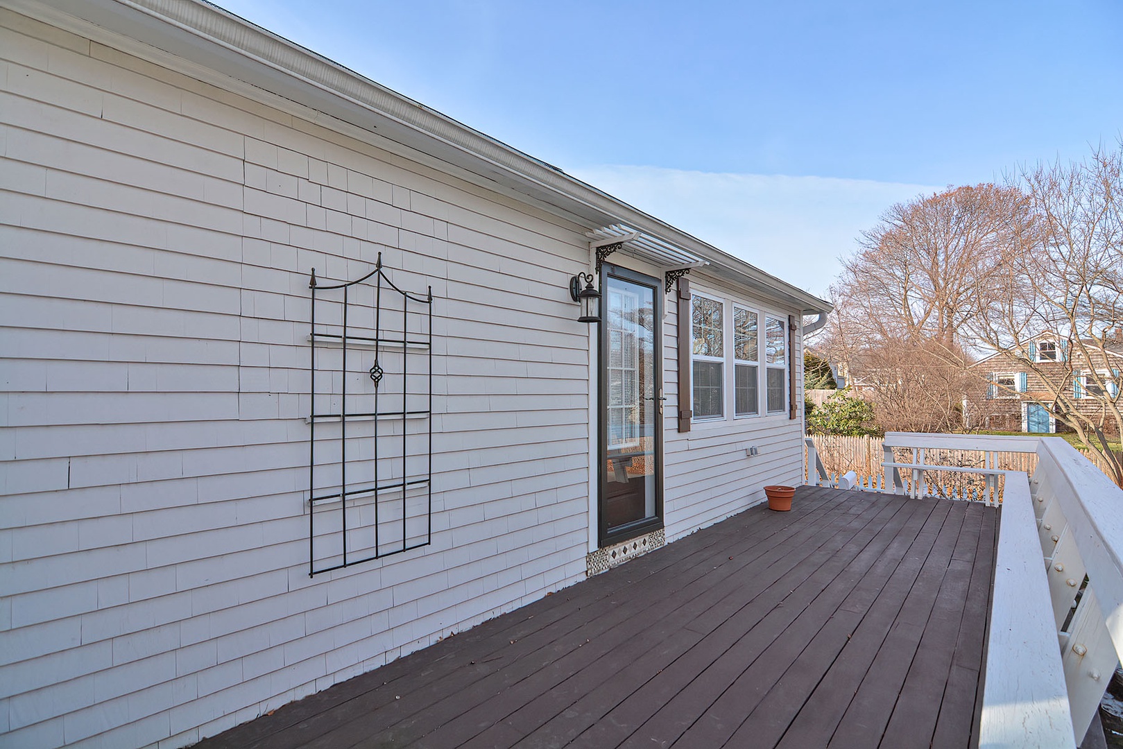 The first deck is off of the kitchen.