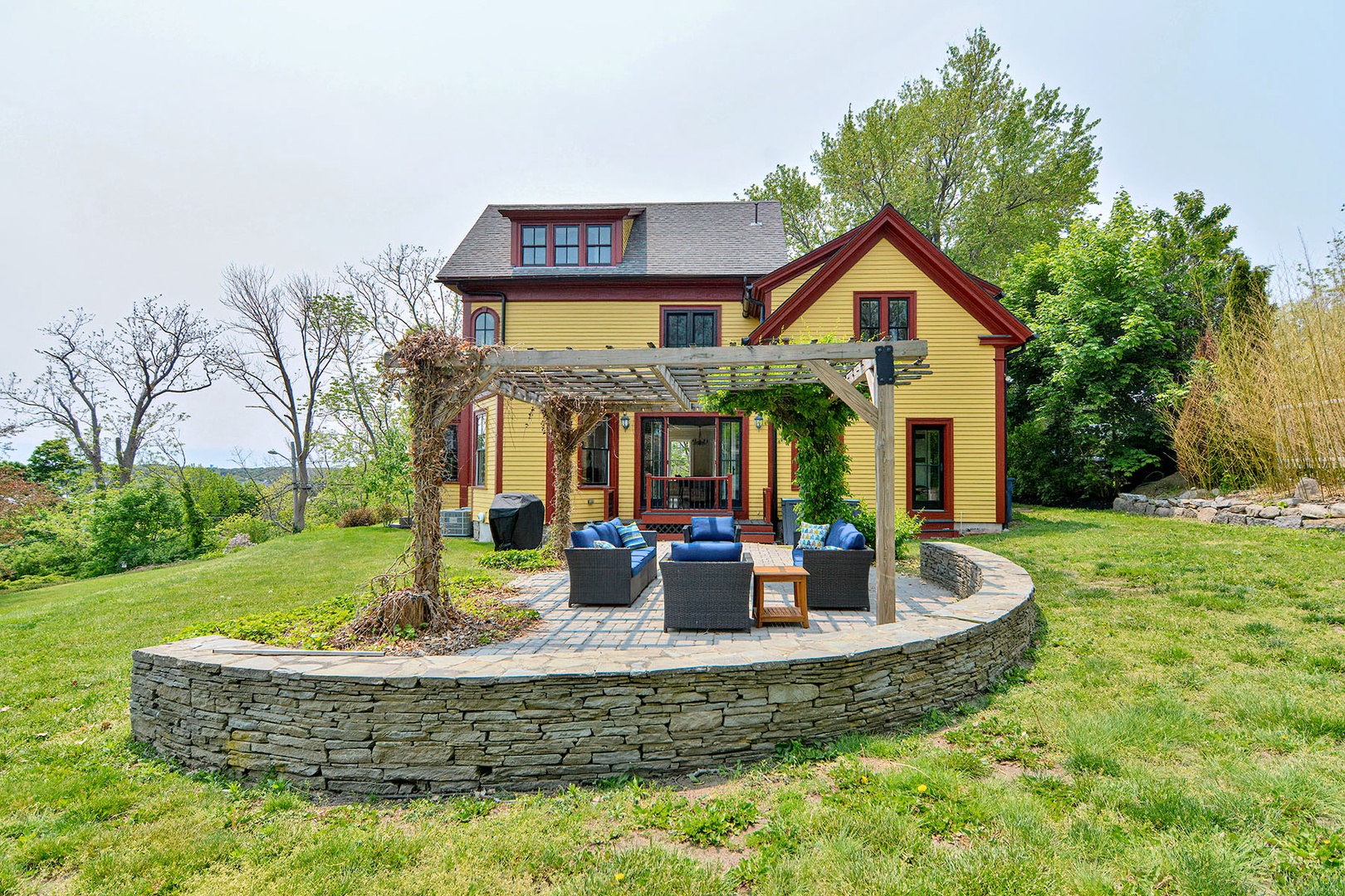 Back patio with a grill and views