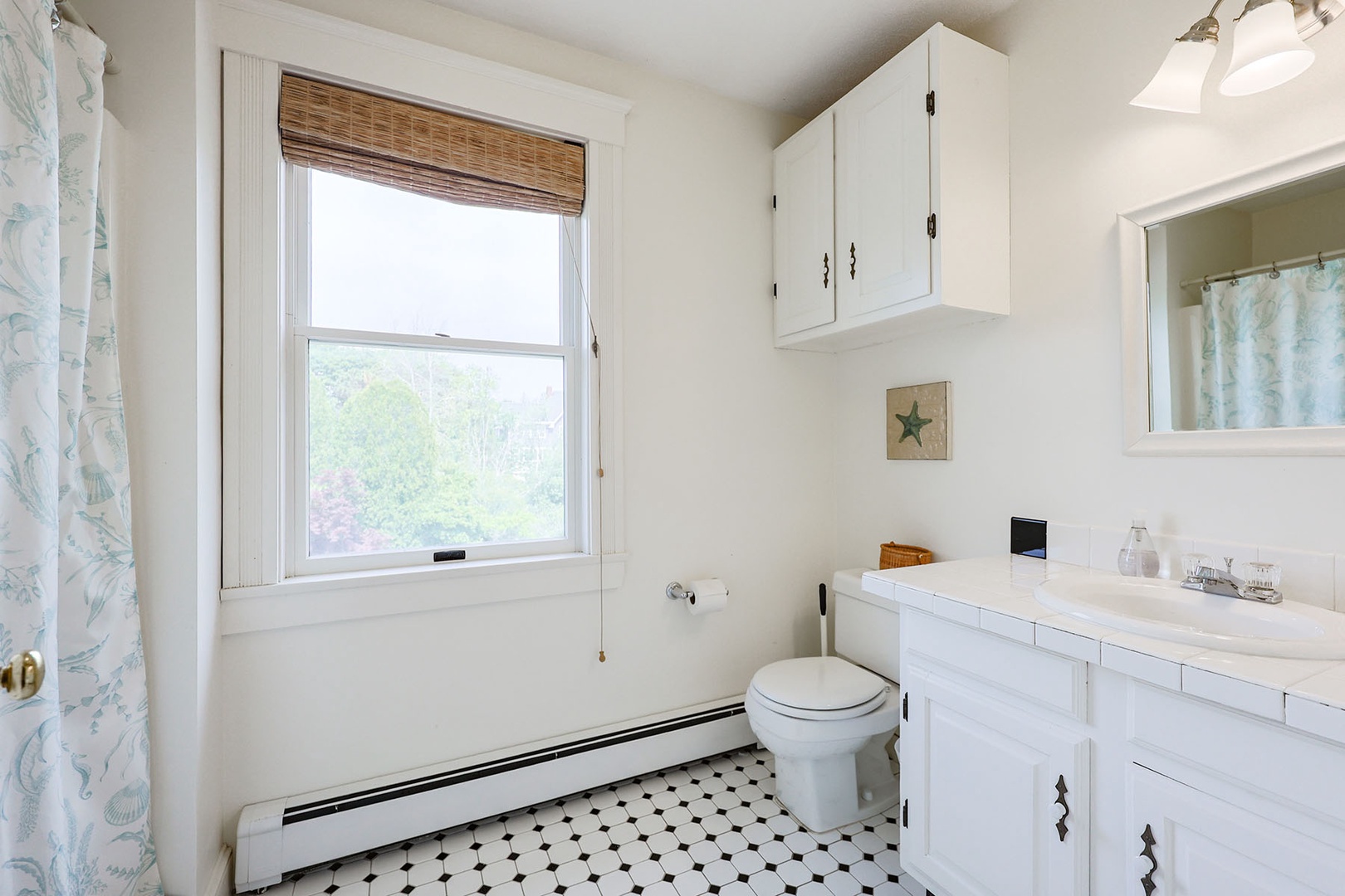 There's a tub/shower combo in the second floor bath.