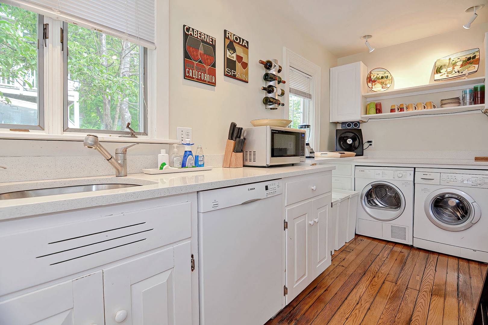 The laundry machines are also in the kitchen.