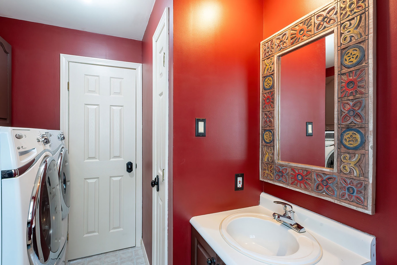 First floor half bathroom with laundry