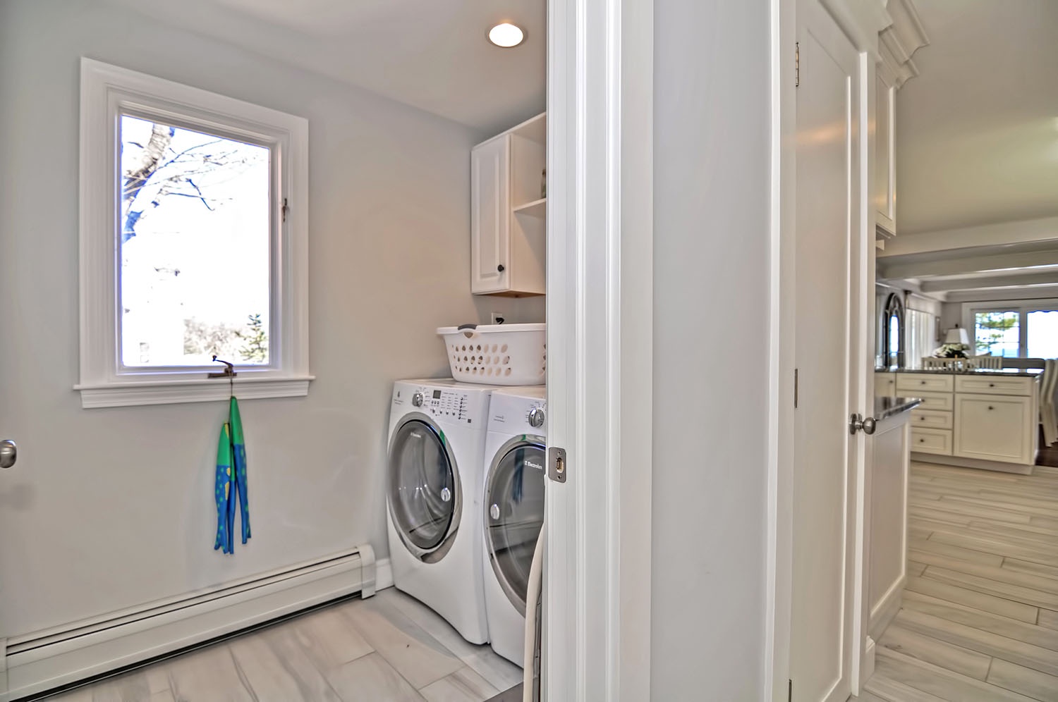 The laundry room is just off the kitchen.