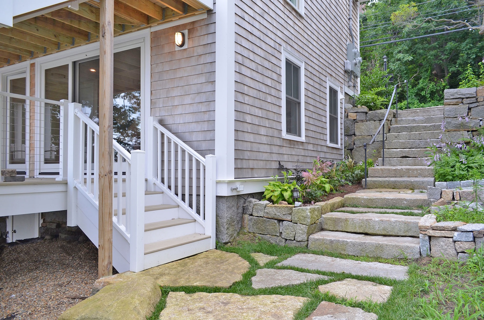 The granite steps down to the main entrance of Sandy Bay.