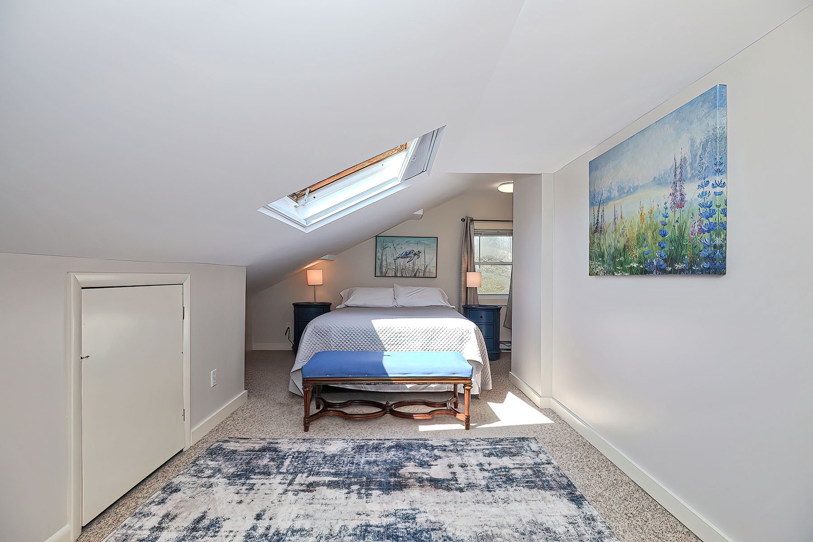 Bedroom 1: Upper level Queen suite.