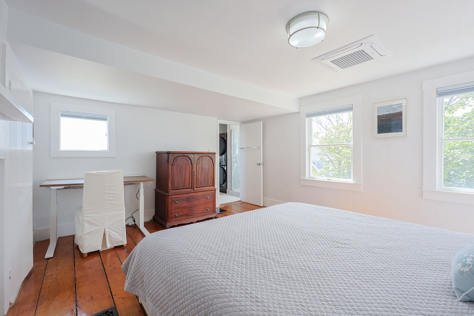 Primary bedroom includes a workspace.
