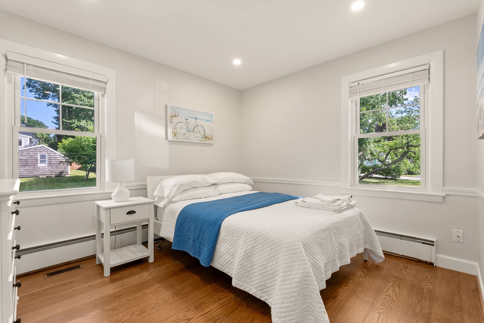 The second bedroom with a full bed in the ground floor.