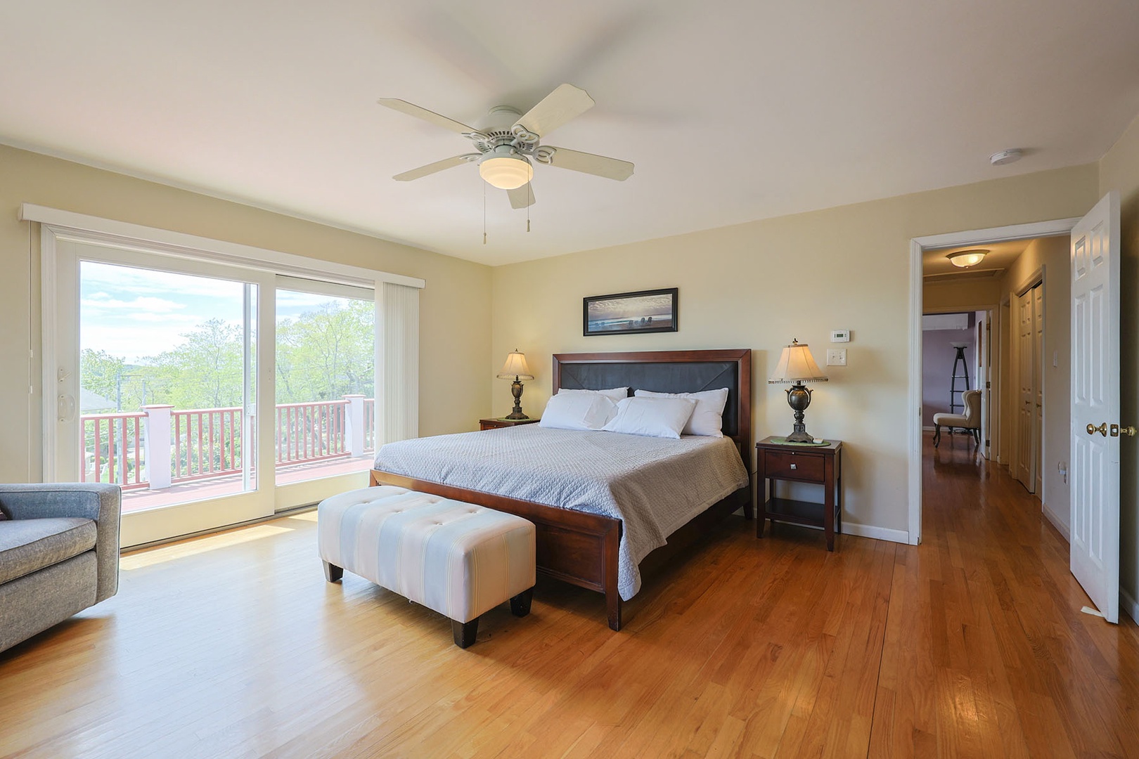 The primary bedroom with a king bed and an ensuite bath