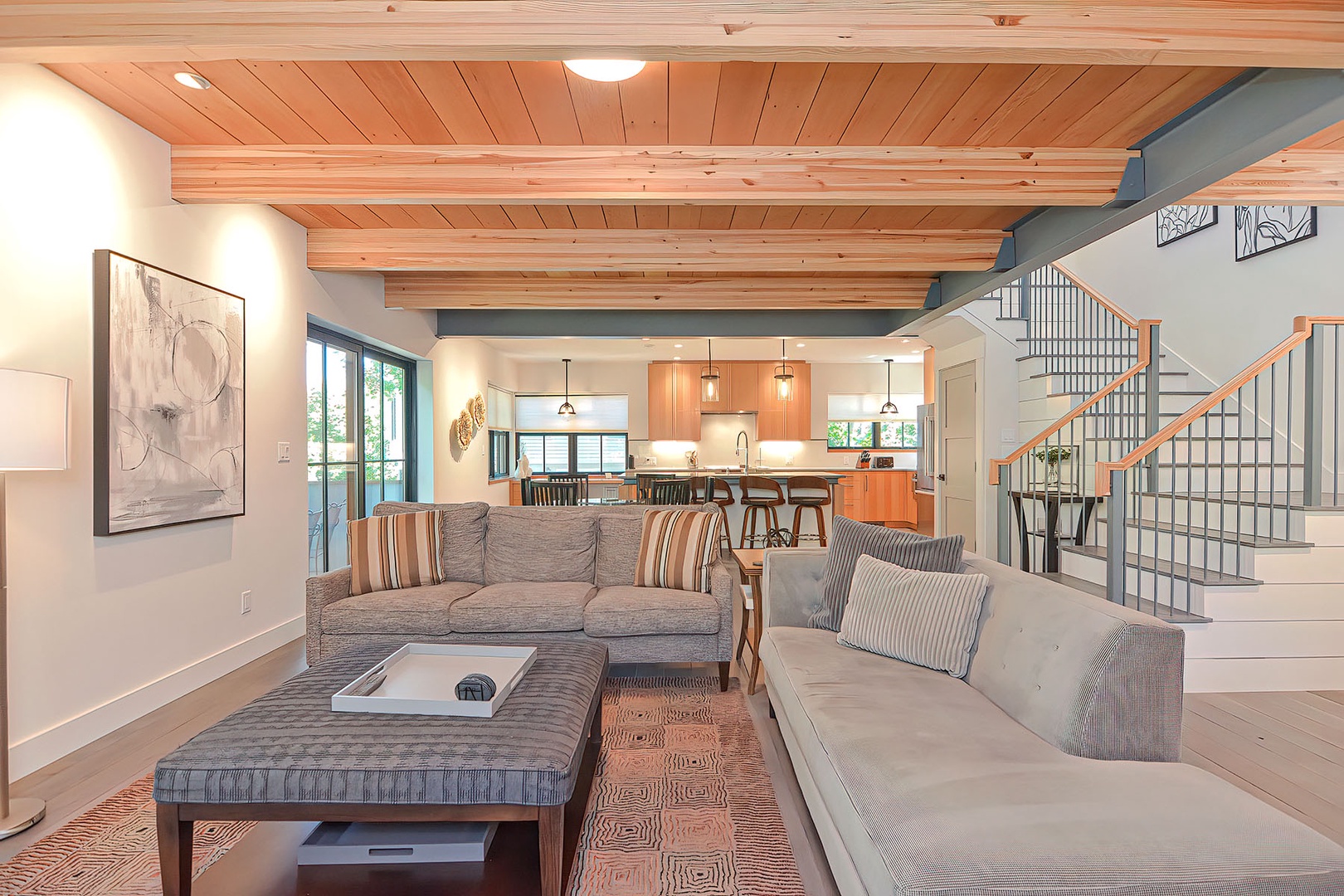 The living room, looking toward the dining area and kitchen.