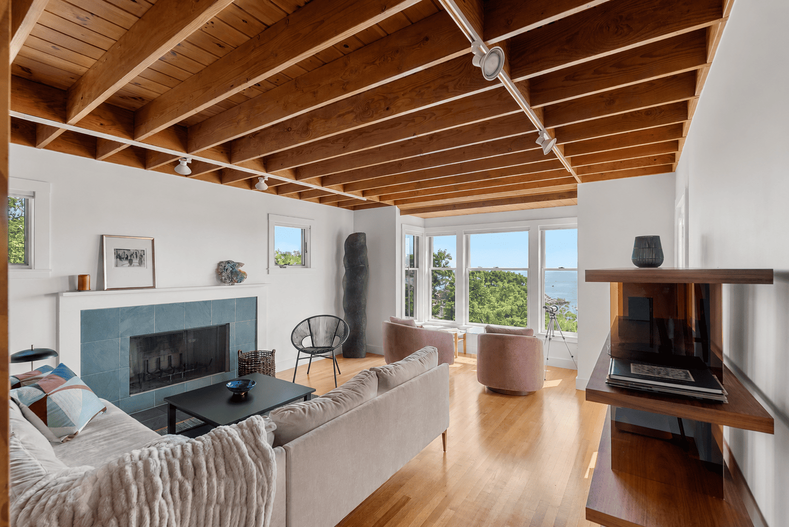 Bright and spacious living room with beautiful ocean views.