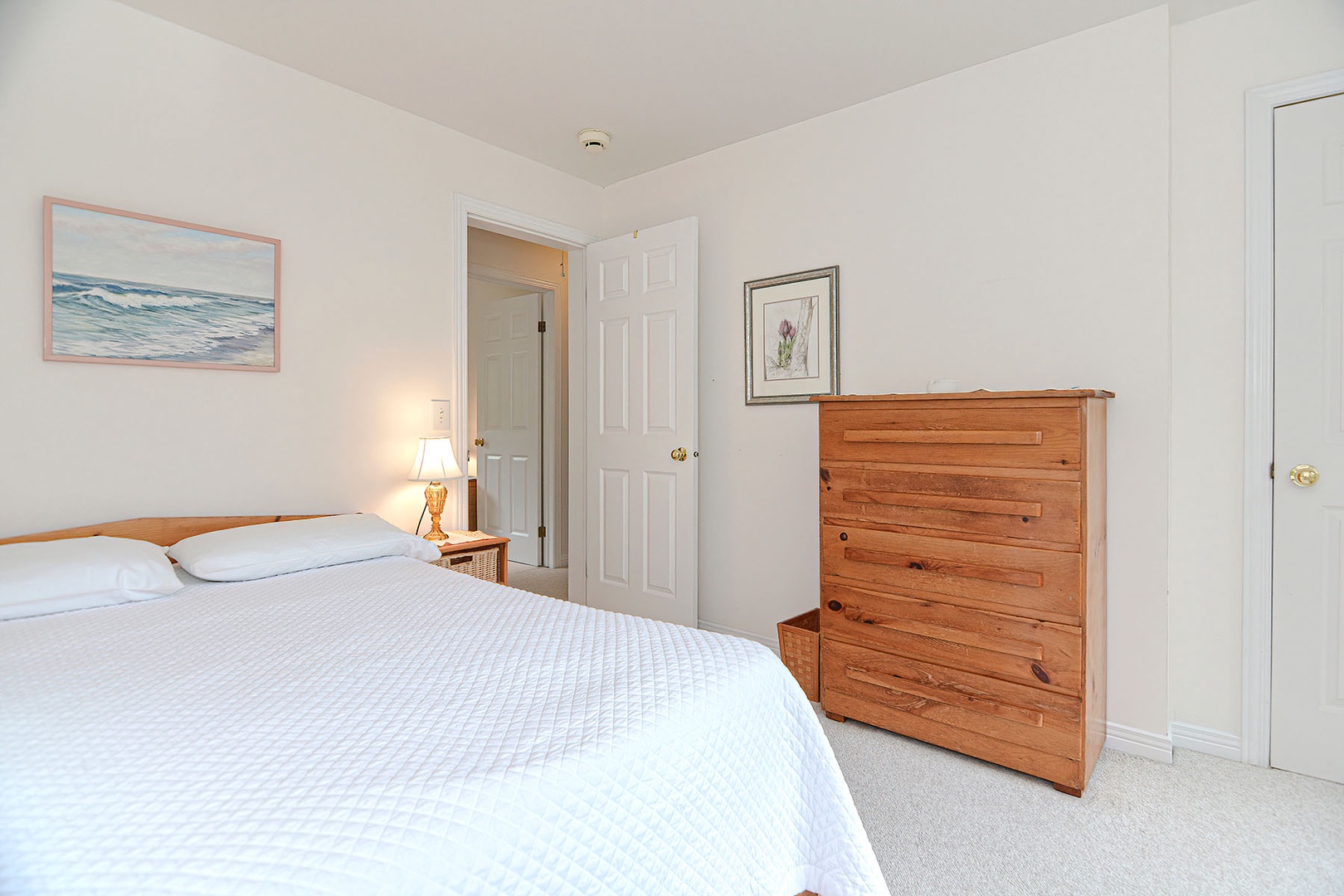 This room comes with large picture windows, a Full bed, and A/C.