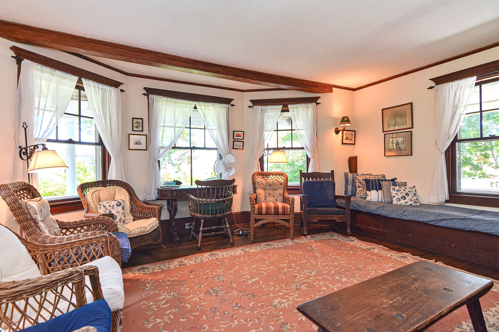 Living room with plenty of sitting chairs.