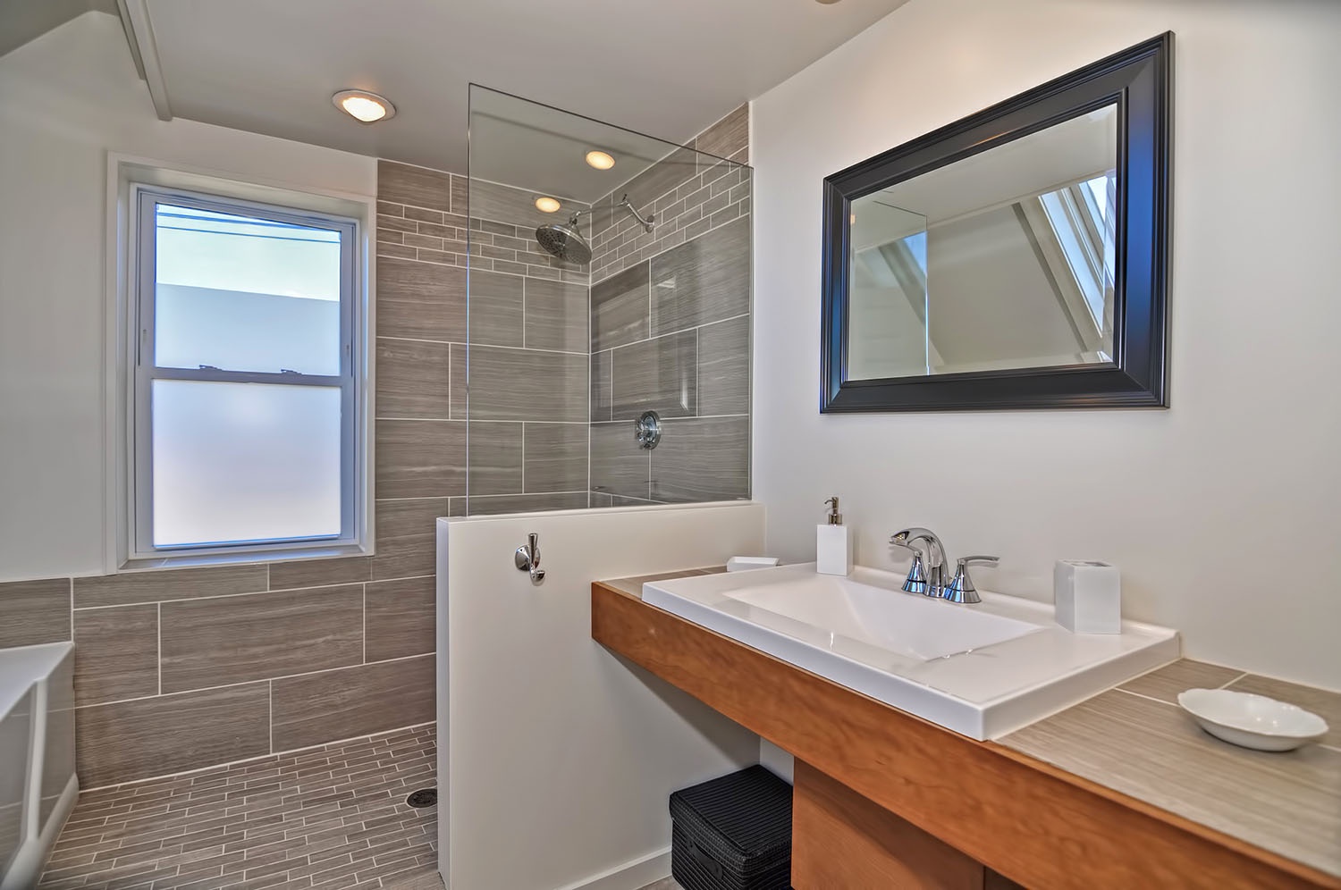 The full bath has a European-style shower.