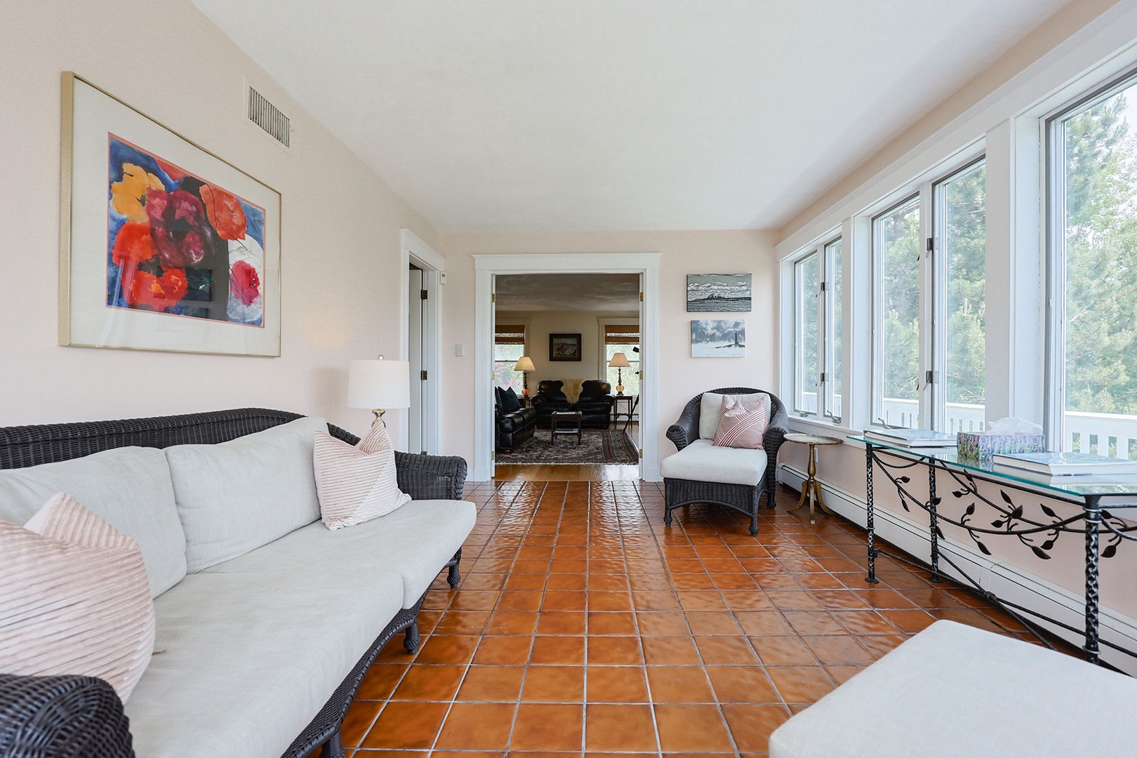 The sun porch is located just off living room 2.