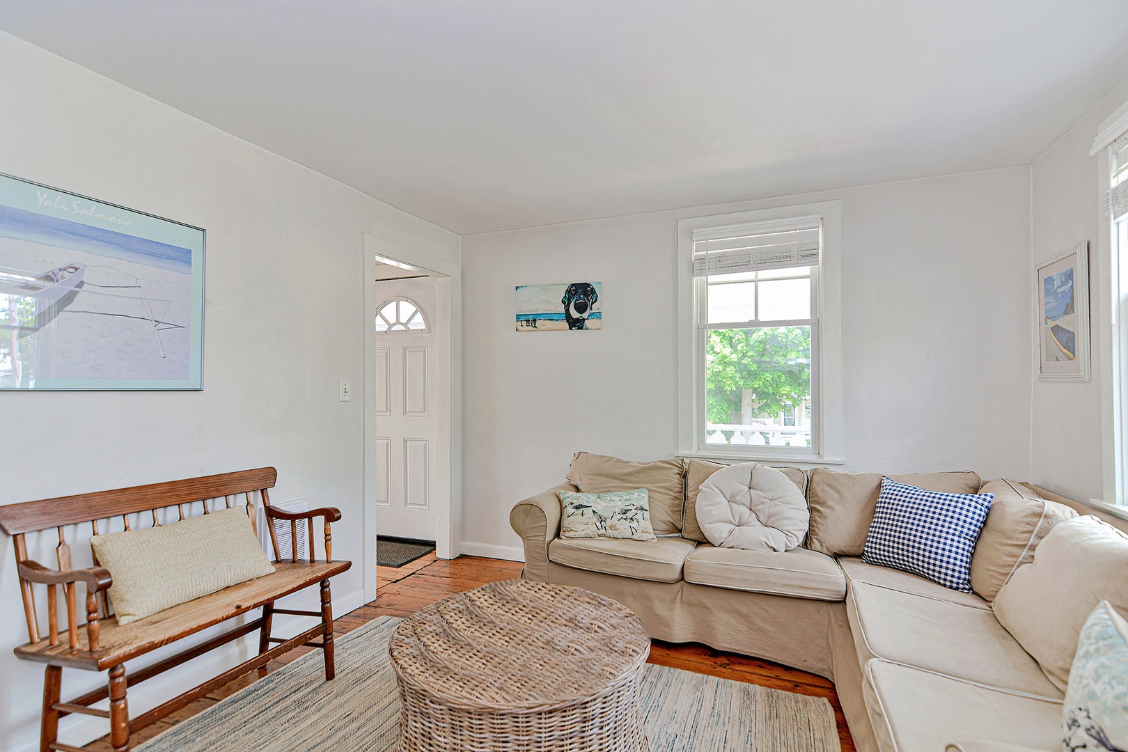 The Living Room has a comfy sectional sofa and flatscreen TV.