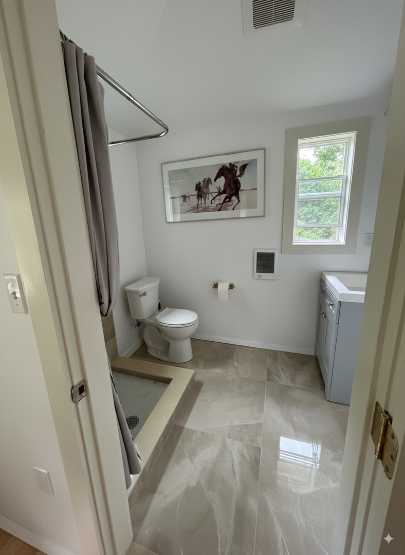 Full bathroom with shower.