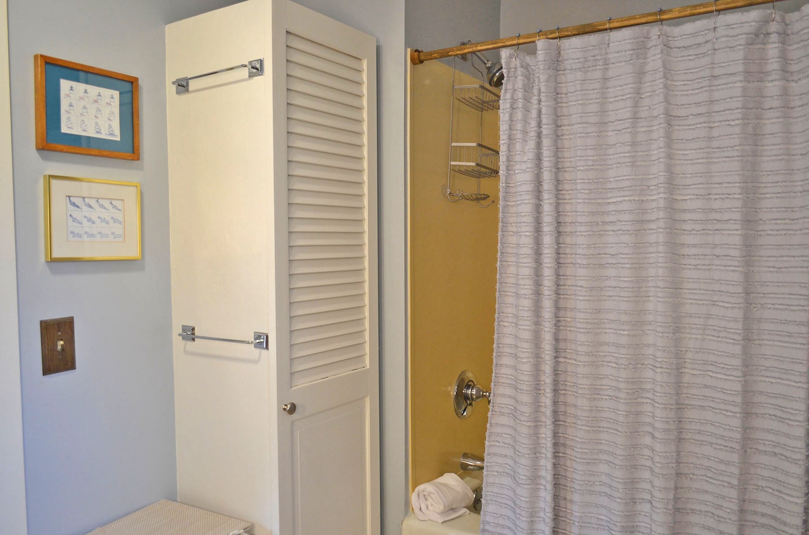 The linen/storage closet in the upstairs bathroom.