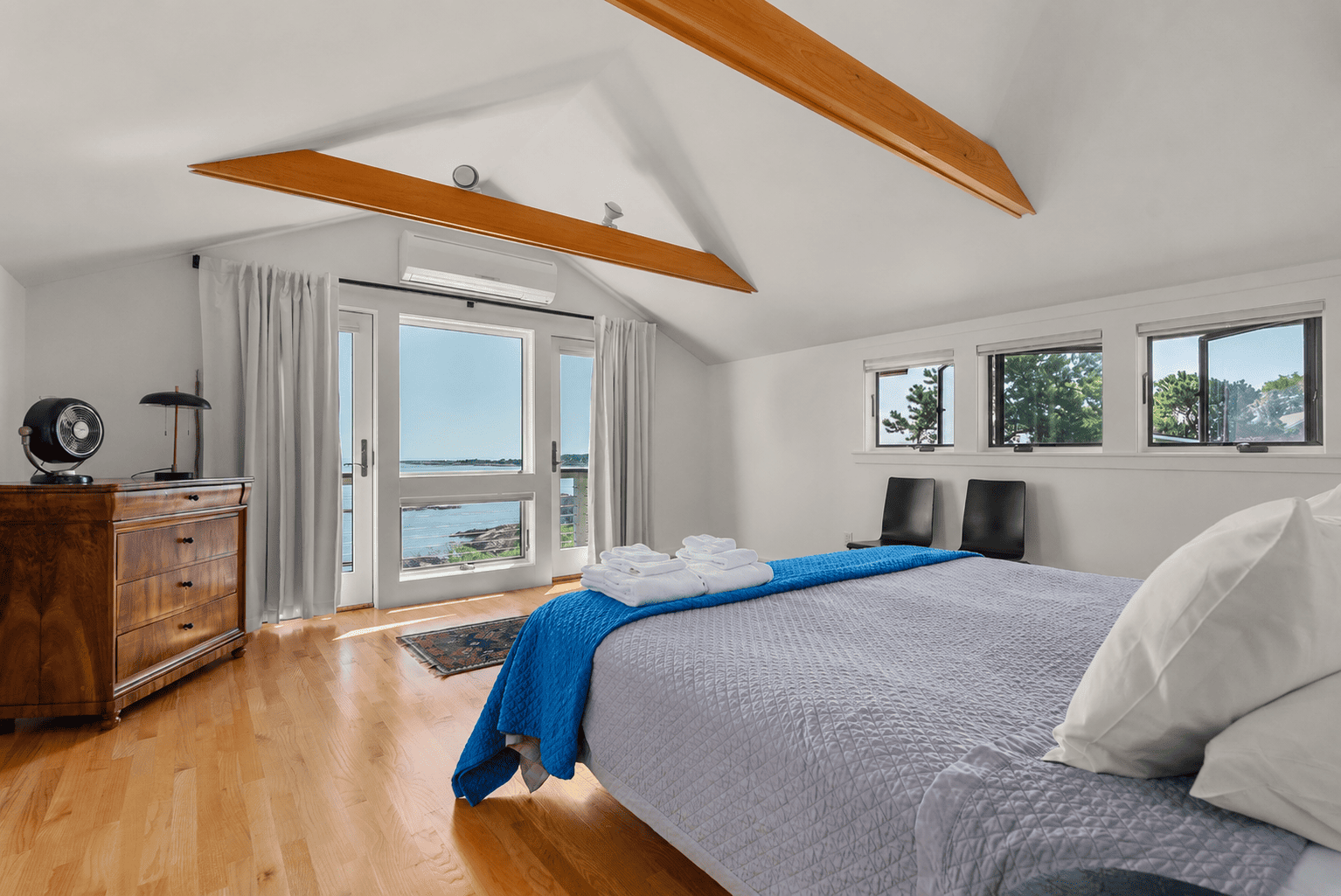 Primary bedroom with a king bed, balcony and amazing views.