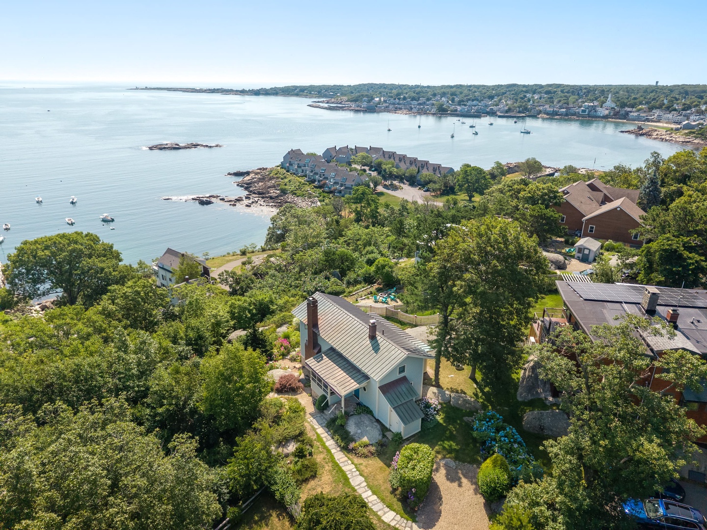 Aerial view of the house with beautiful views of Sandy Bay.