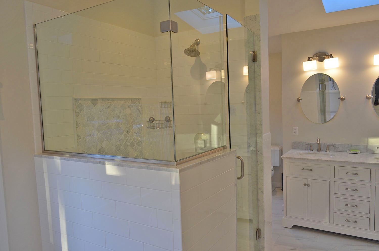 BR 1: Step in to the spacious walk-in shower