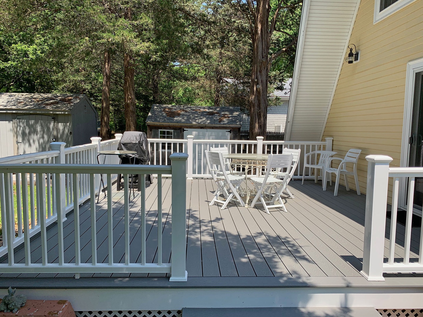 Grill, dine, or relax on the back porch.