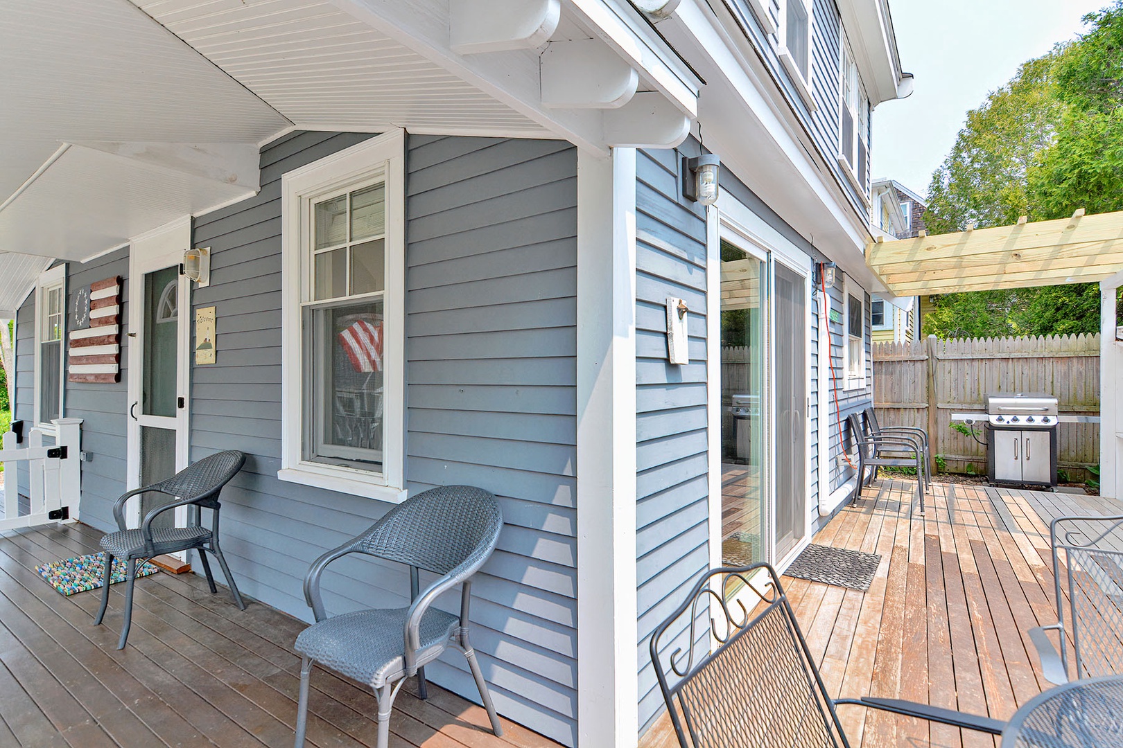 The generous porch wraps around the house.