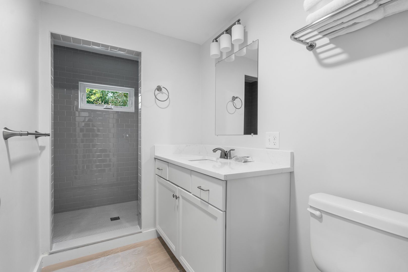 The primary full-bathroom with walk-in shower.