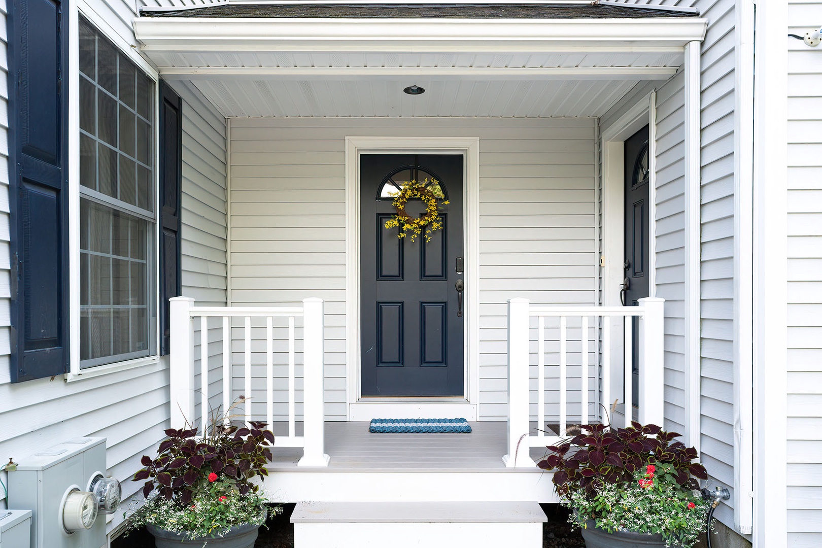 Front entrance, with the apartment entrance on the right