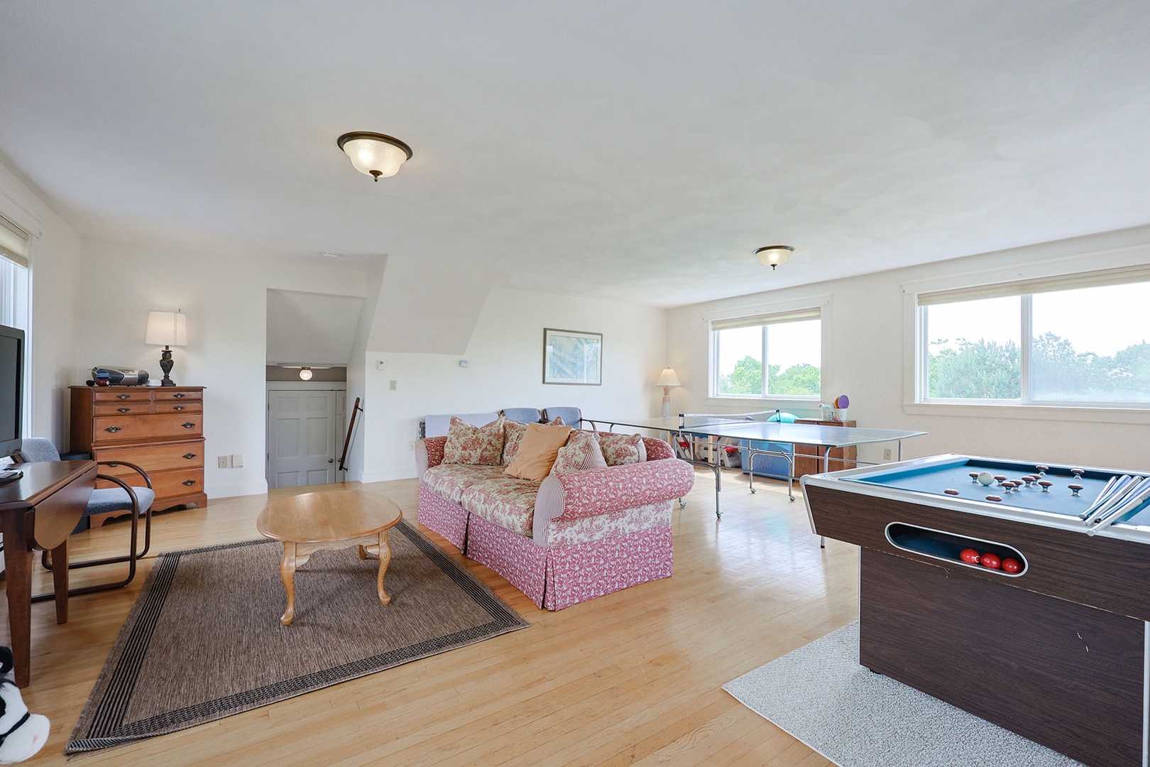 The games room is just up a short stairway from the hallway.