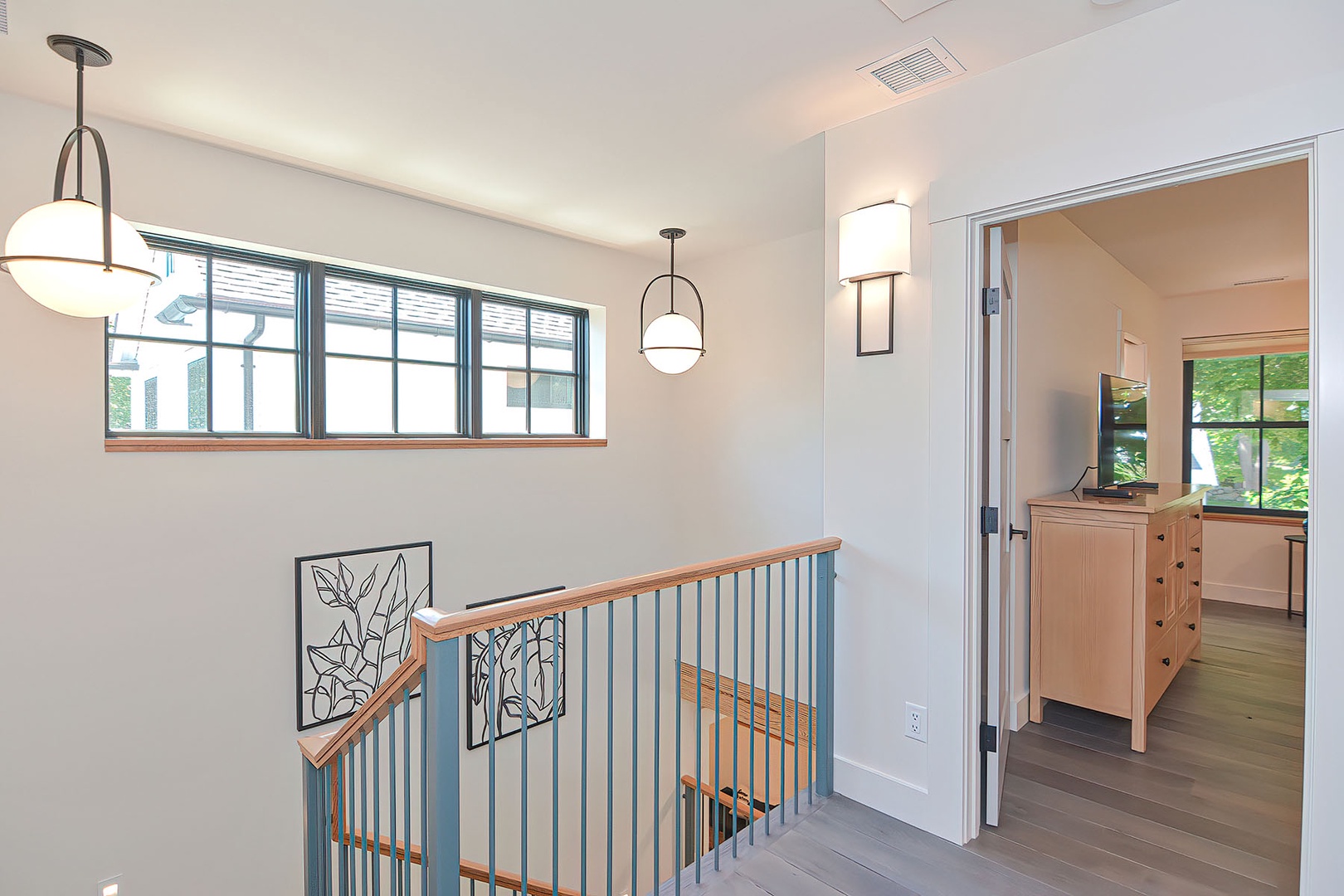 Upstairs landing, looking toward the Primary bedroom.