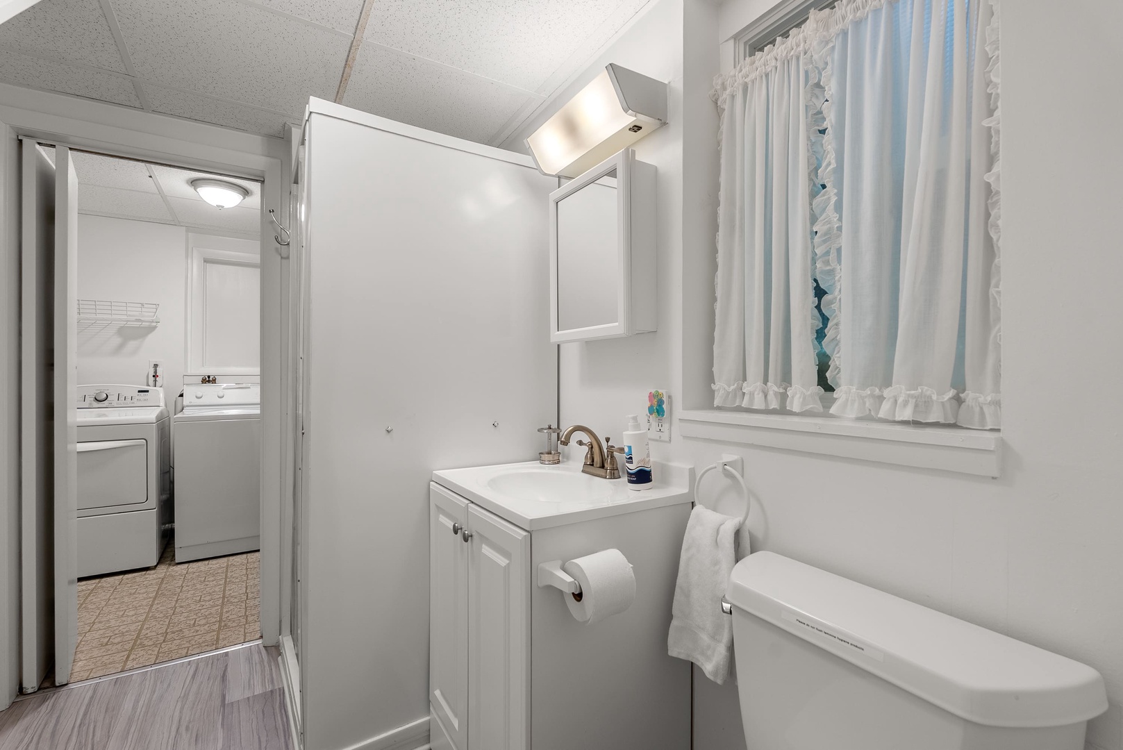 The ground floor bath has a step-in shower.