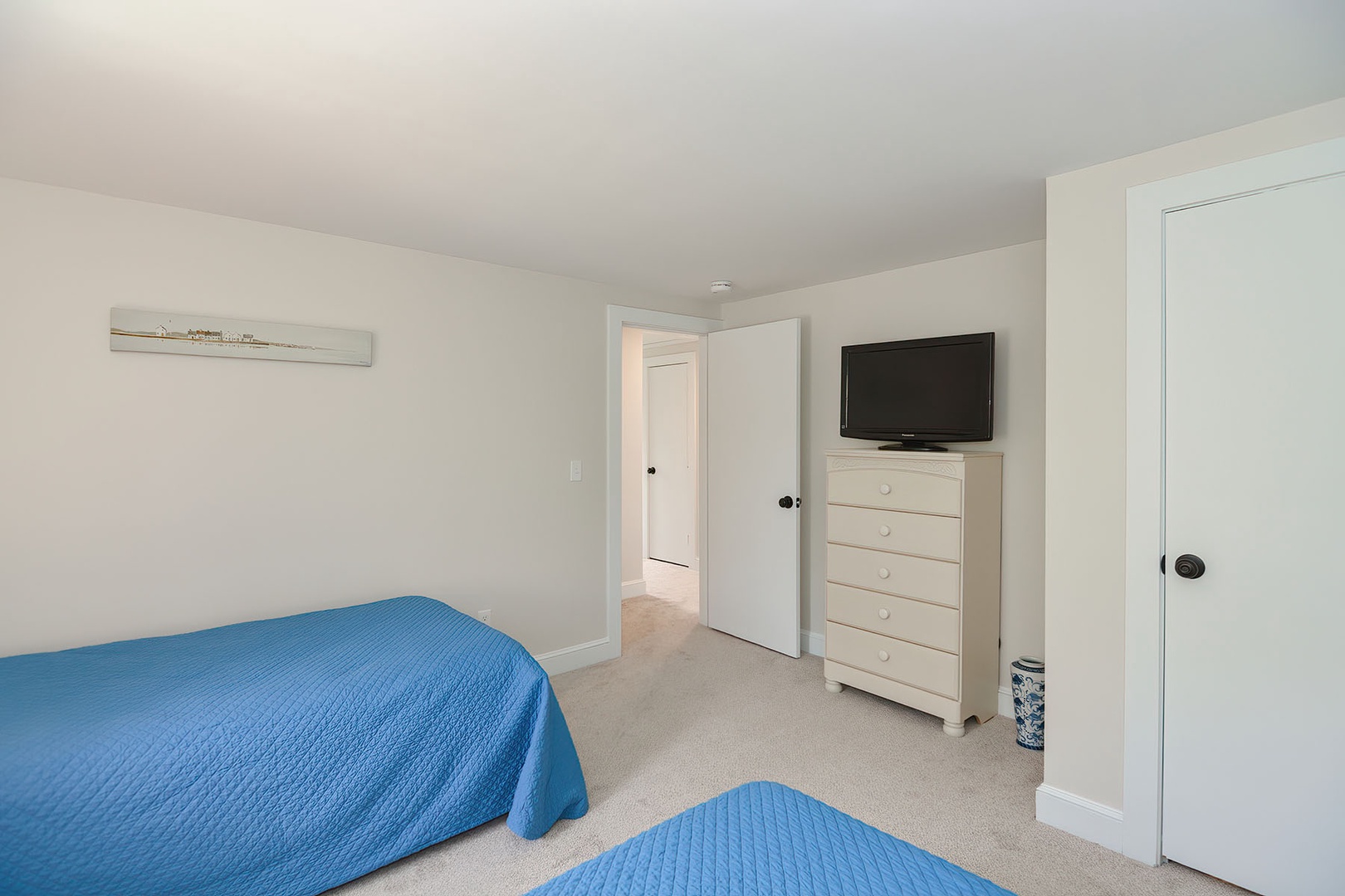 Bedroom 3: Twin beds with TV.