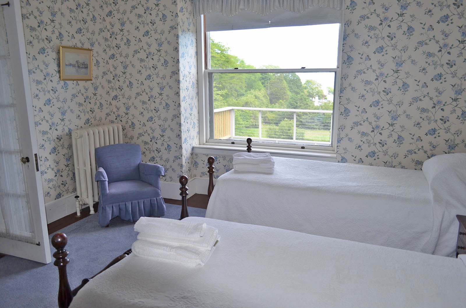 Bedroom 3: Twin bedroom with ocean views and an ensuite bath.